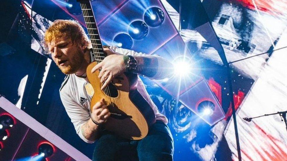 Ed Sheeran with a one-of-a-kind prototype Equals guitar