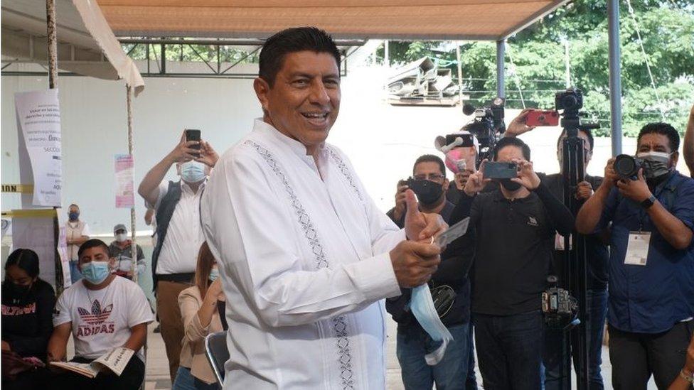 Salomon Jara, candidate for Morena, waves after voting in Oaxaca, Mexico, 05 June 2022.