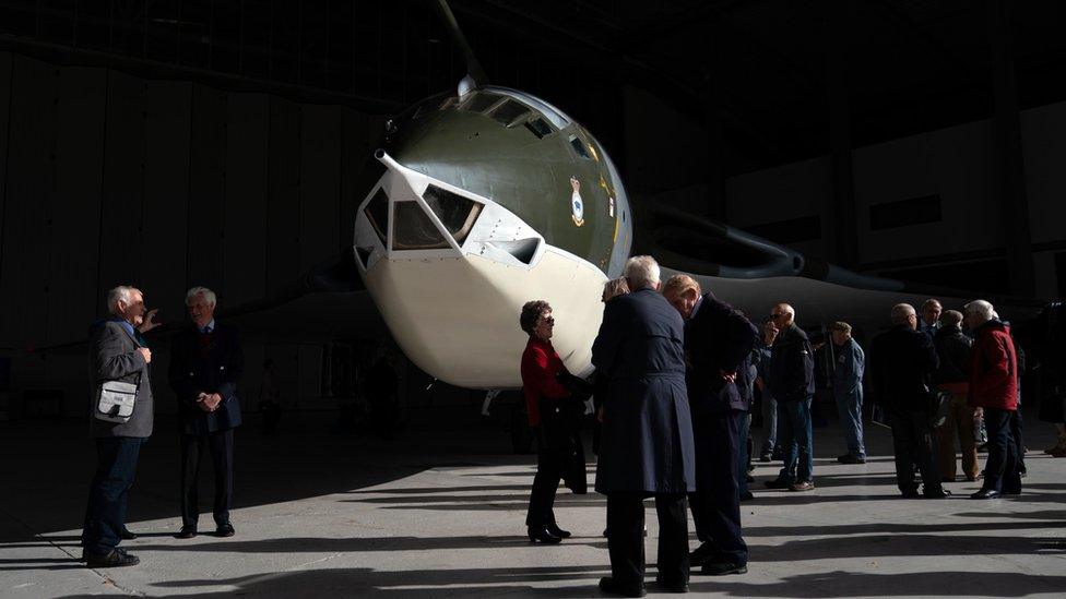 Cold War veterans, many of whom operated or worked on this very aircraft, admire the Handley Page Victor XH648 aircraft, which is on show at IWM Duxford, Cambridgeshire, following the completion of a five year restoration project