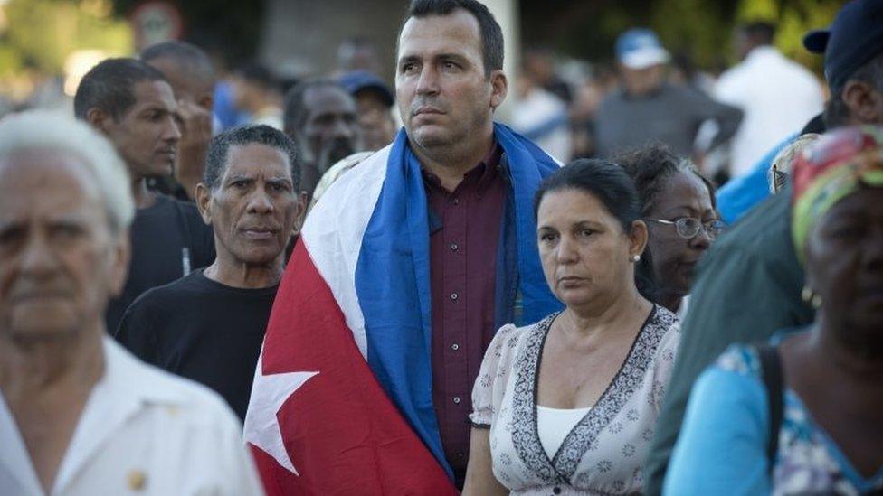 Mourners wait to enter the Revolution Plaza in Havana, Cuba, Monday, Nov. 28, 2016.