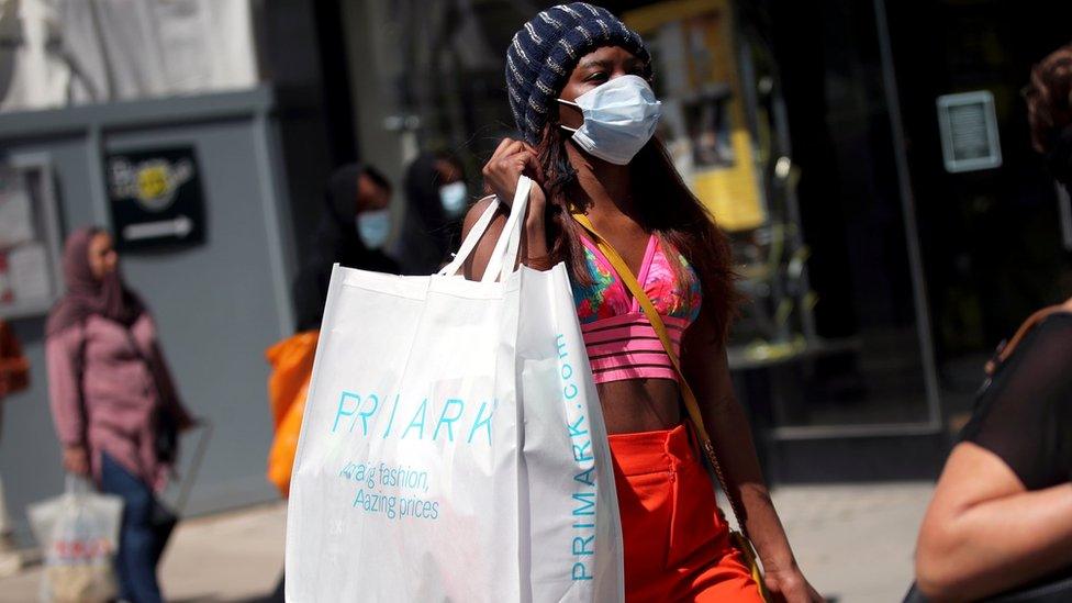 Woman with Primark bag