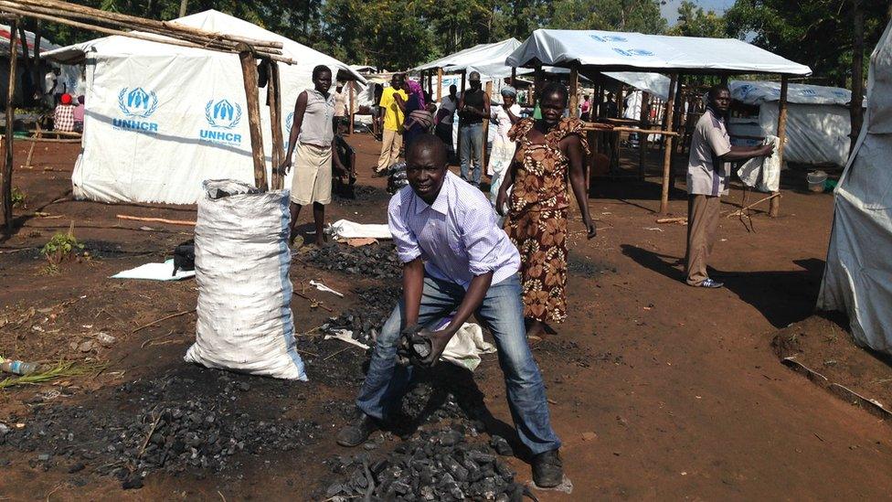 Abdul Karim Ali selling charcoal in the market