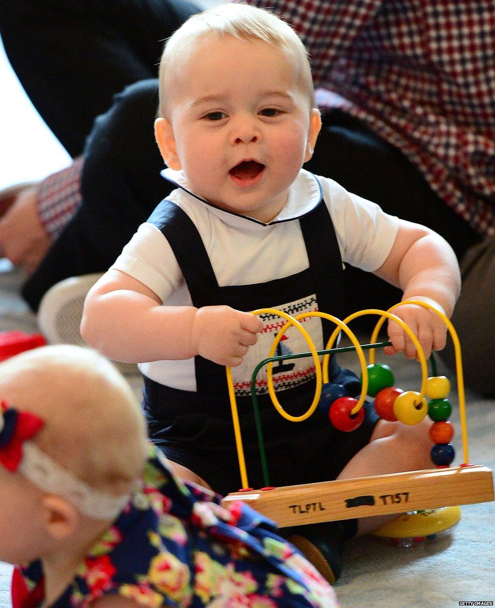 The young prince playing with toys at a play group in New Zealand on his first official trip abroad.