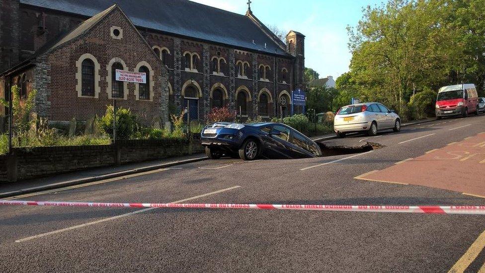 Car in hole