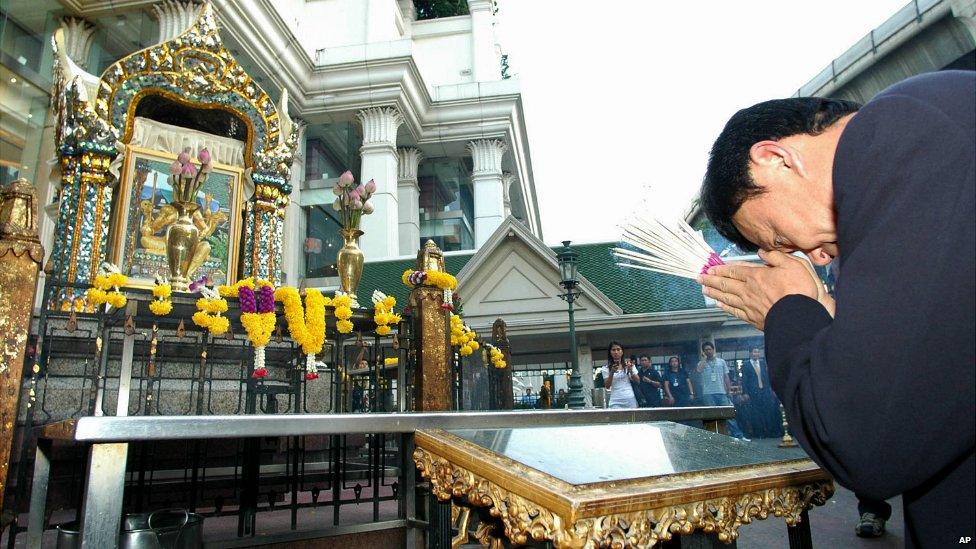 Thaksin Shinawatra offers prayers at the damaged Erawan Shrine in downtown Bangkok, Thailand - 22 March 2006