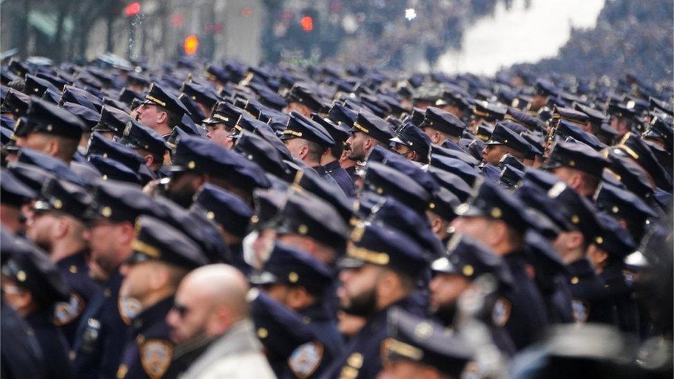 Officers lined the streets for the funeral of NYPD Detective Wilbert Mora