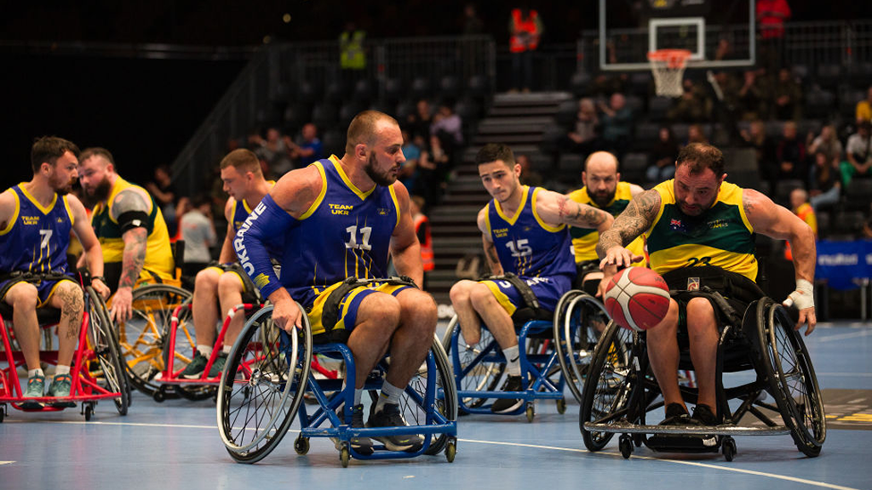 Wheelchair basketball players from Ukraine take on Team Australia during the 2023 Invictus Games in Düsseldorf