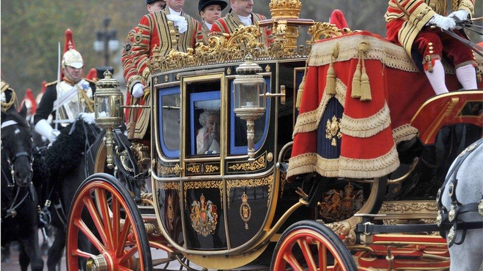 The Queen in a horse-drawn carriage at the state opening of Parliament in 2009