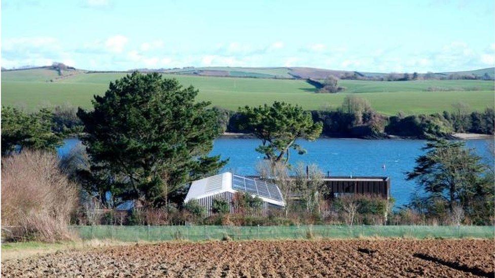 The land with the garage in the forefront