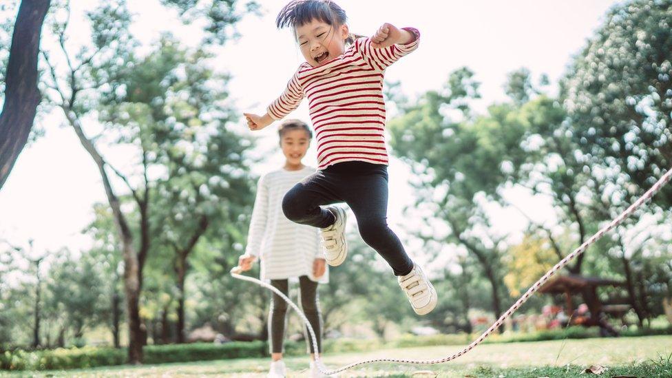 two-girls-skipping