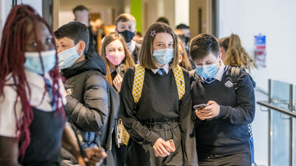 Students at St Columba's High School, Gourock, wear protective face masks as they head to lessons as the requirement for secondary school pupils to wear face coverings when moving around school comes into effect from today across Scotland.