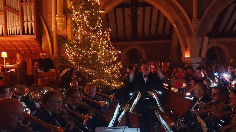 Manx Concert Brass playing in Kirk Braddan