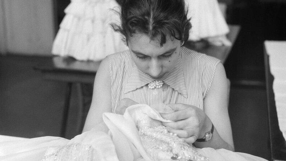 Dressmaking student doing hand embroidery at Shoreditch College, 1958