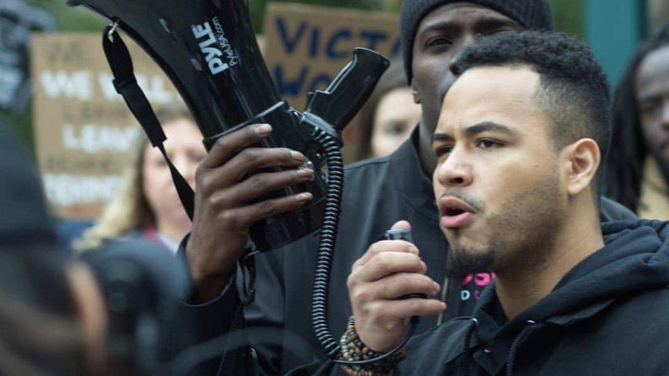 Vidal Guzman speaking at a protest