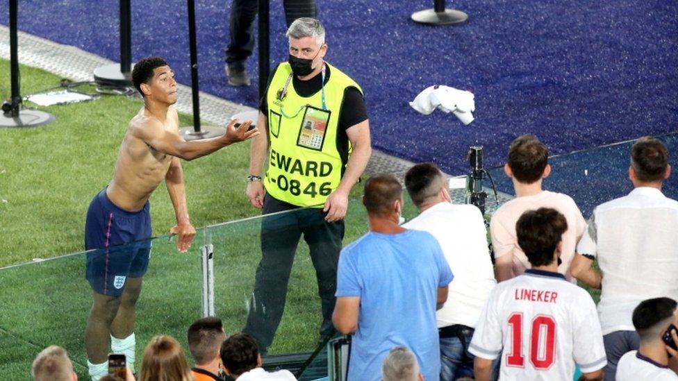 Jude Bellingham throws his shirt to the crowd after the UEFA Euro 2020 Quarter Final match at the Stadio Olimpico, Rome