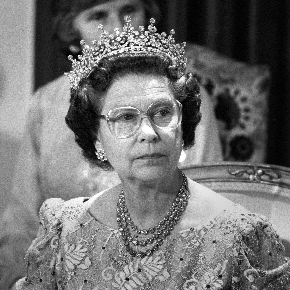 Queen Elizabeth II at a reception and banquet in Berlin's Charlottenburg Castle after arriving with the Duke of Edinburgh for a two-day visit to join in the city's 750th anniversary celebrations.