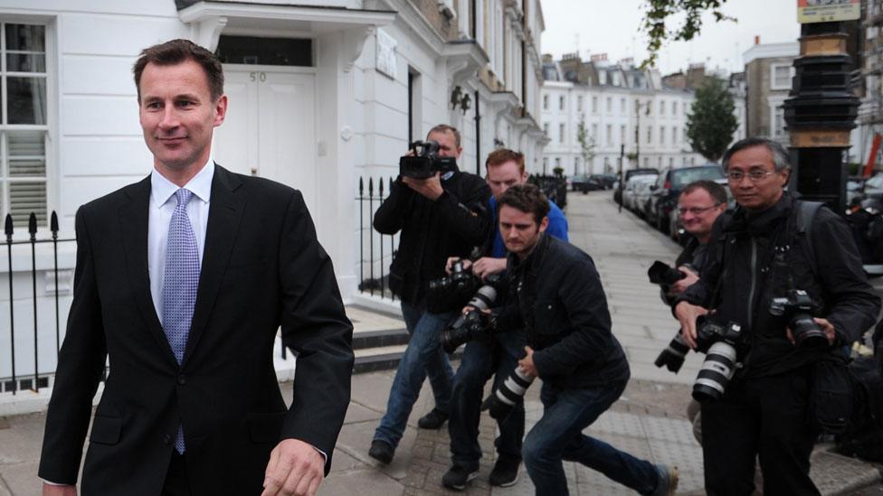 Jeremy Hunt being pursued by the press in 2012