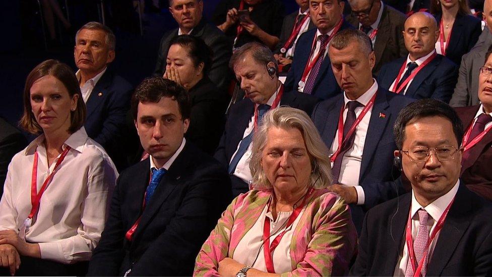 Karin Kneissl was caught dropping off during Vladimir Putin's keynote speech in Vladivostok on Tuesday