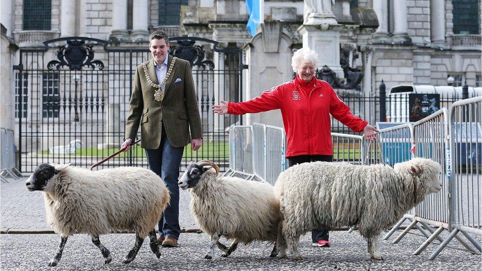 Dame Mary Peters and Lord Mayor Gavin Robinson not at all sheepish on the streets of Belfast