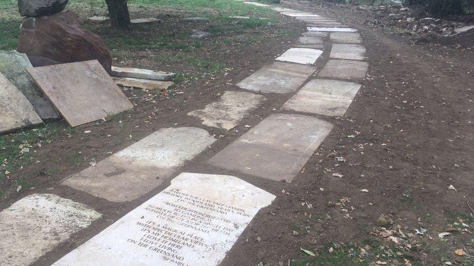 Gravestones in a path