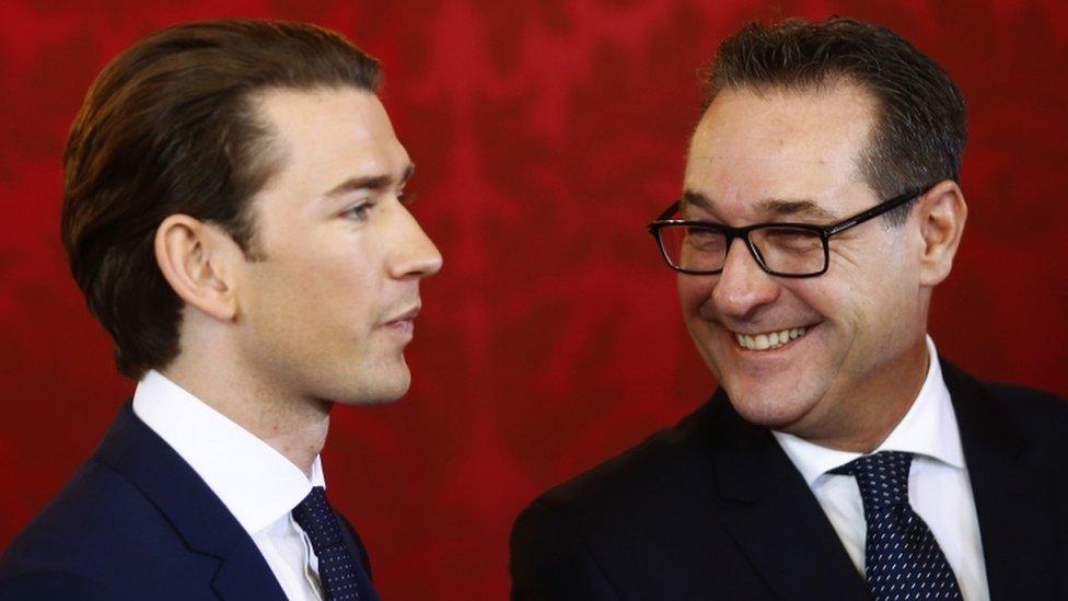 Austrian Vice Chancellor Heinz-Christian Strache (right) of the Freedom Party (FPO) smiles next to Chancellor Sebastian Kurz of the People's Party