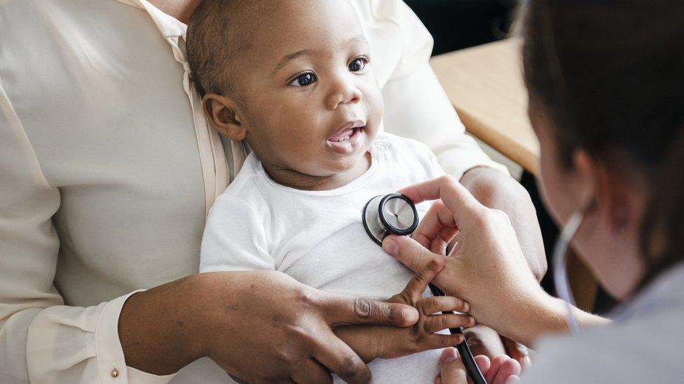 A baby with a doctor