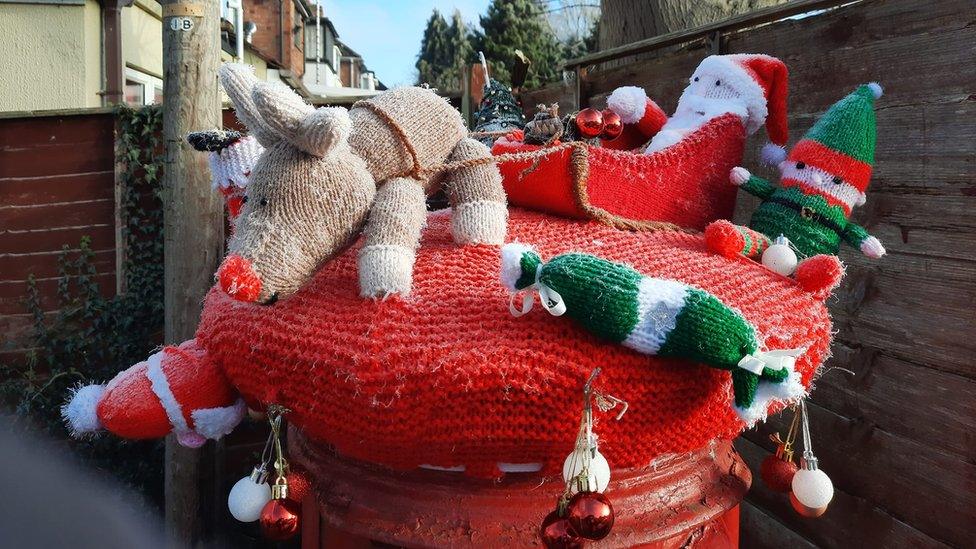 A festive postbox topper