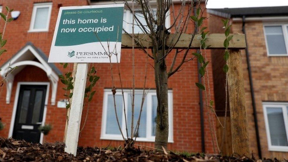 A sign outside a newly-built house (generic)