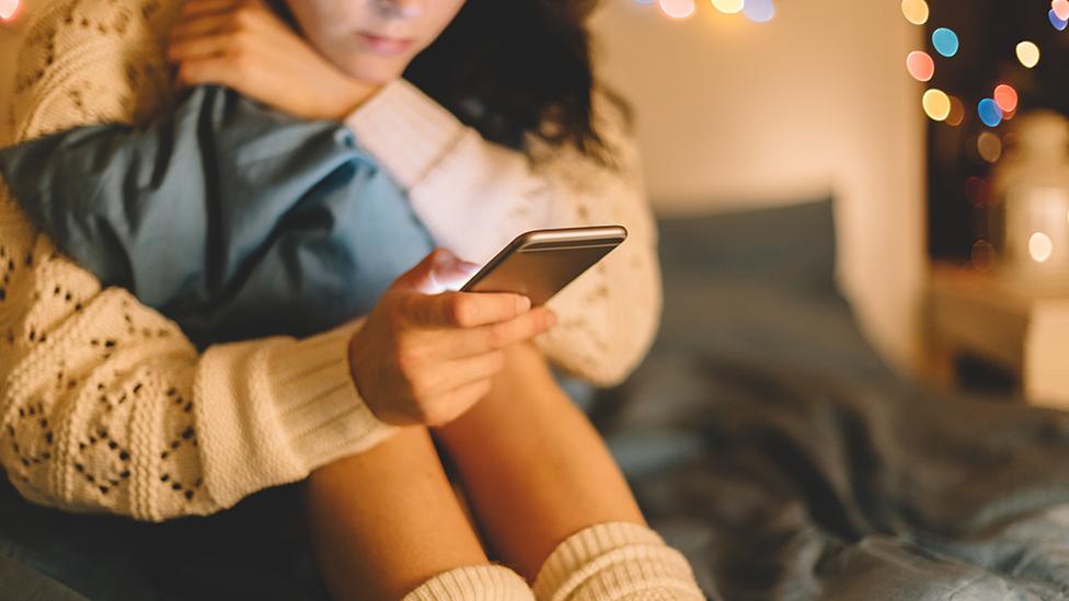 Girl holding a phone