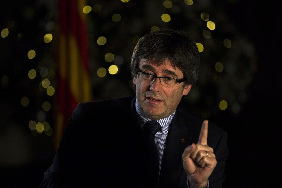 Carles Puigdemont speaks during an interview with The Associated Press in Barcelona, Spain, 16 December