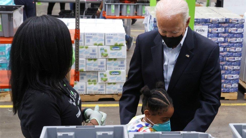 He also received a hug from a young girl at the Houston food bank