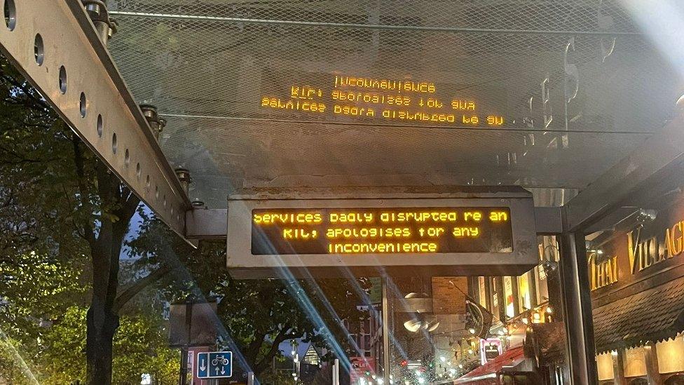 Bus stop digital sign with message for passengers