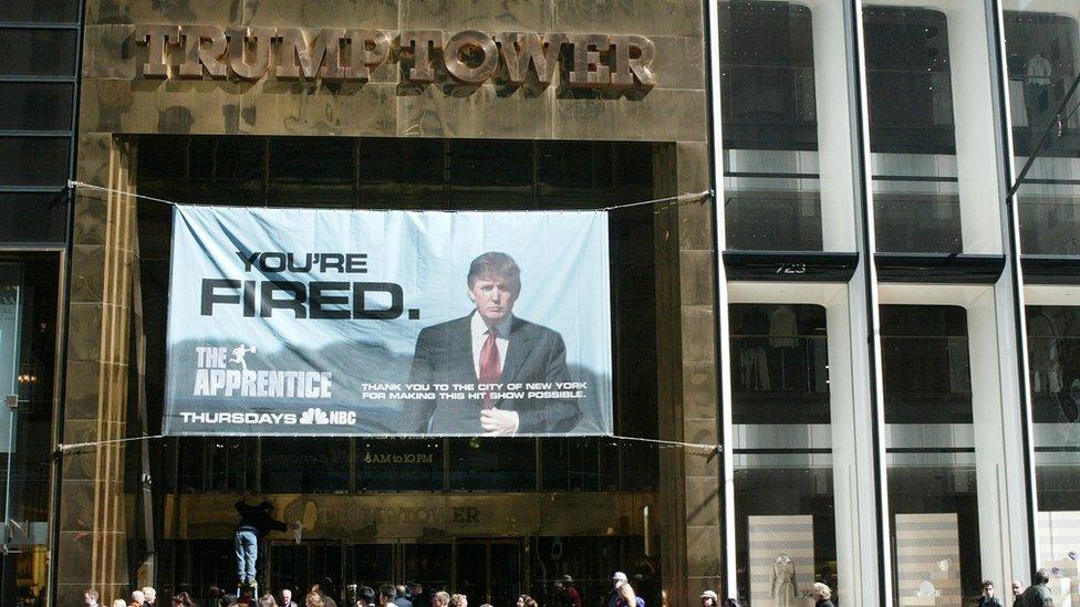 Trump tower with sign for the Apprentice