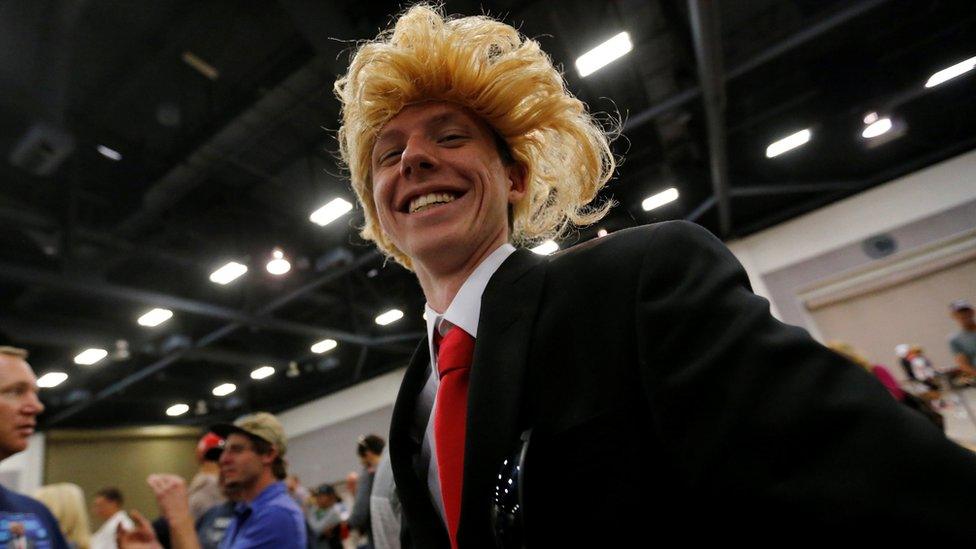 Trump supporter in wig at Albuquerque rally on 24 May 2016