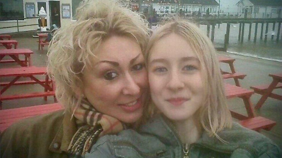 A photo of Lily and her mum when she was growing up.