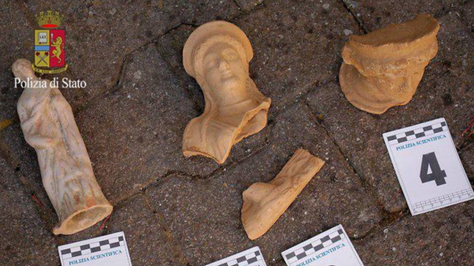 A police photo of some of the terracotta figures seized