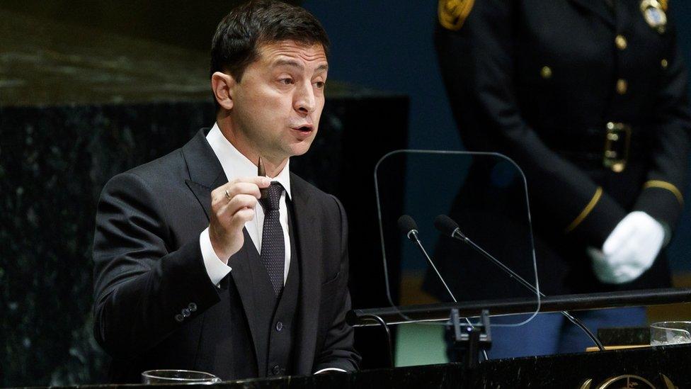 Ukraine"s President Volodymyr Zelensky holds up a bullet while addressing the UN General Assembly on 25 September