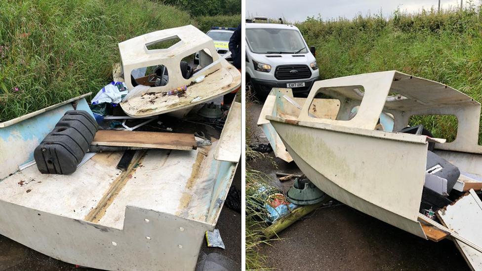 Abandoned boat in lane