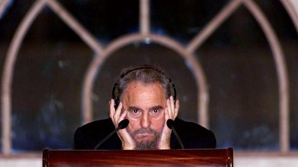 This file photo taken on May 11, 2001 shows Cuban President Fidel Castro listening as he addresses a public lecture in Kuala Lumpur.