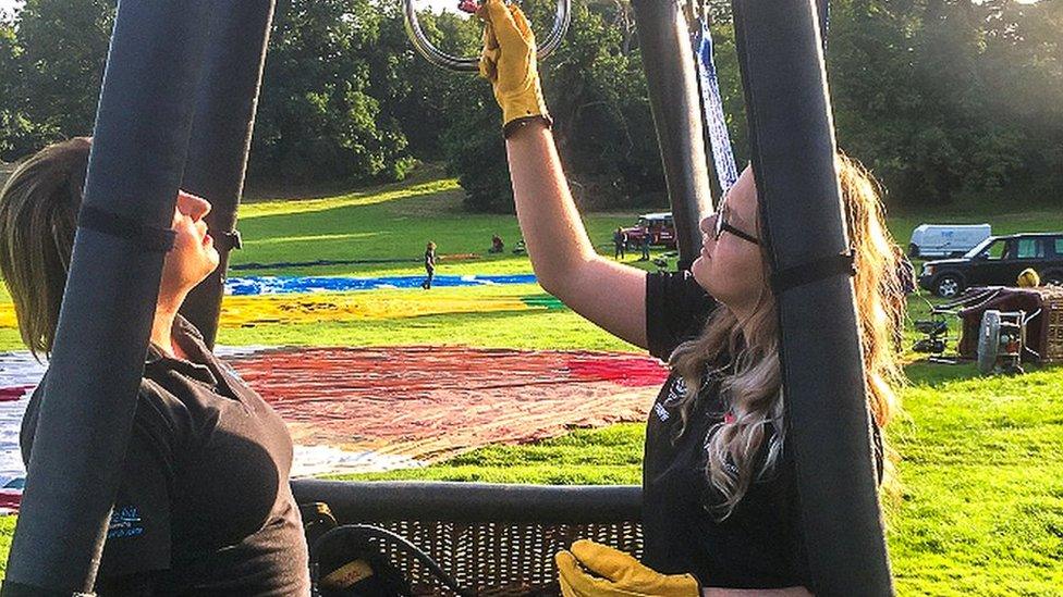 Alyssa Pitt in a hot air balloon basket