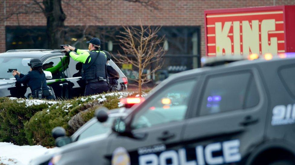 Police officers surround King Soopers on Table Mesa Drive in Boulder after reports of shots fired inside on 22 March 2021.