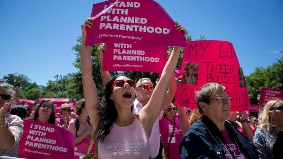 Claire Contreras, 30, reacts during a Planned Parenthood rally outside the State Capitol in Austin, Texas.