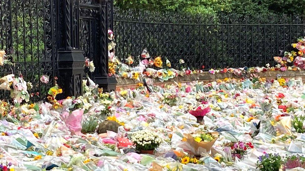 Floral tributes wrapped in plastic