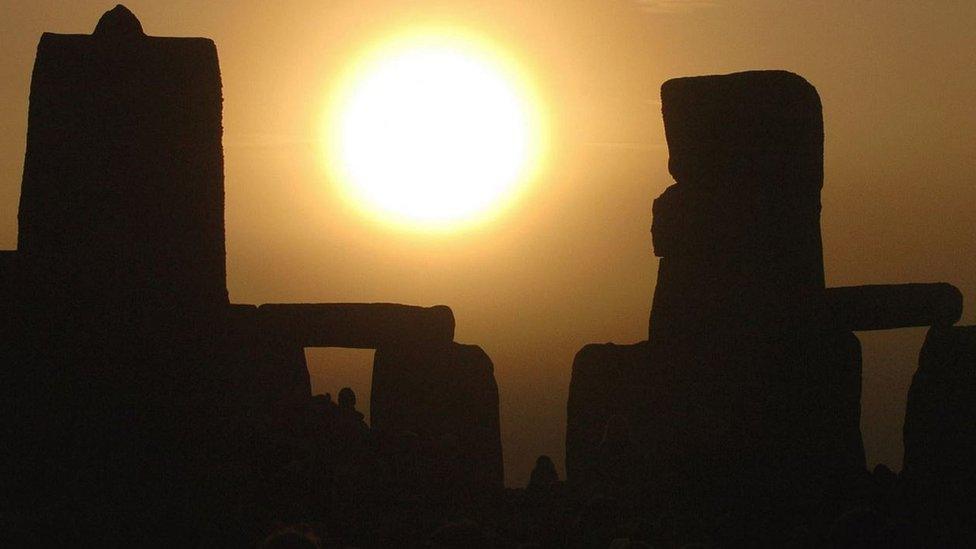 The sun rises over Stonhenge in Wiltshire