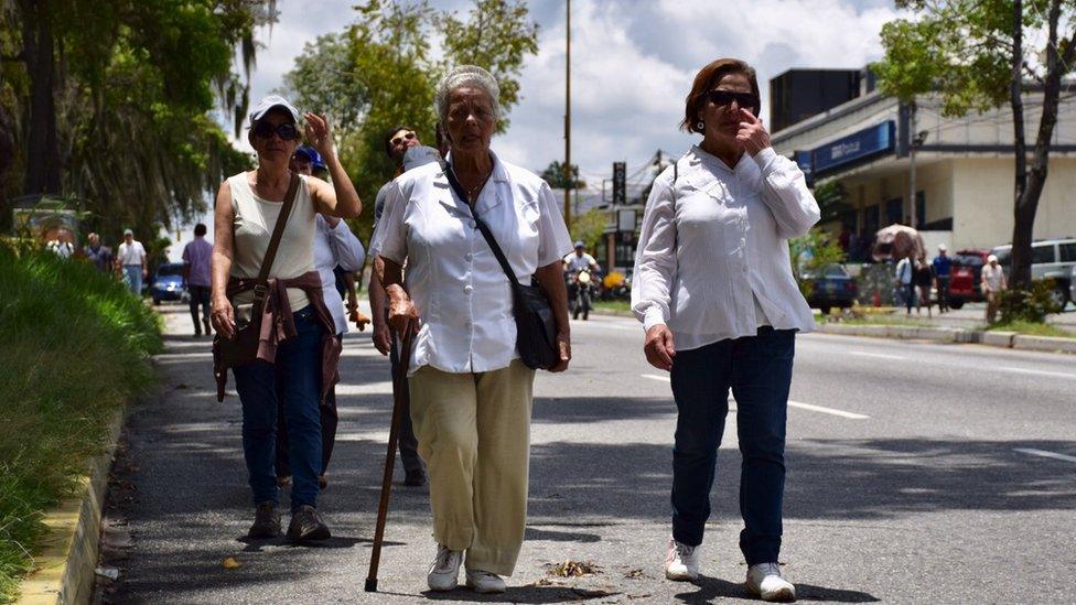 Elderly anti-government marchers in Venezuela