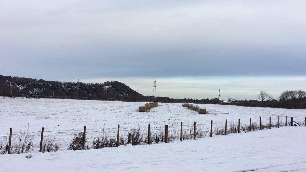 An area of the farmland where the new houses are to be constructed