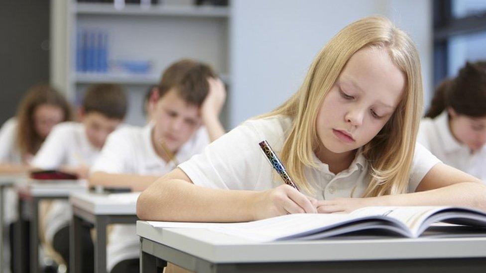 Children sitting an exam