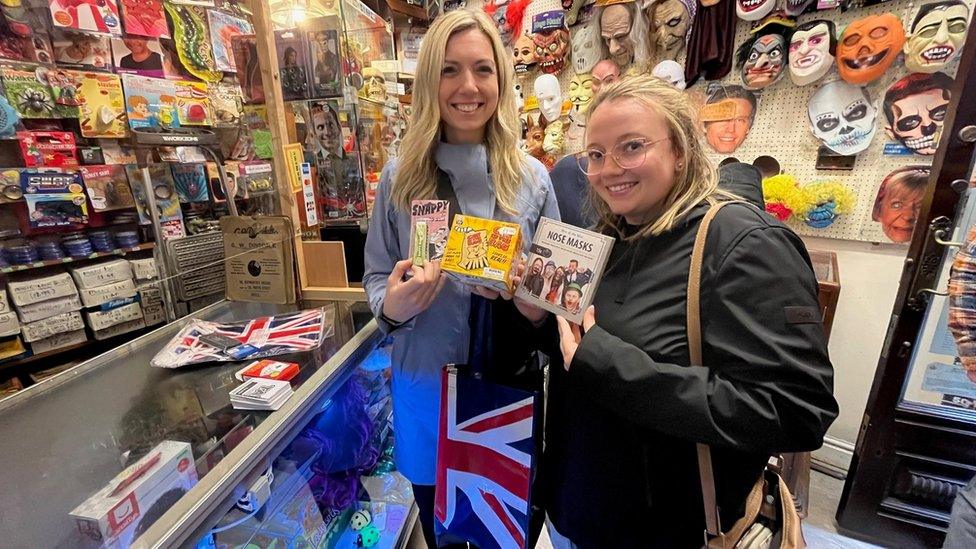 Stephanie Pitcher and Ashley Oates, both from Newfoundland, with novelty items