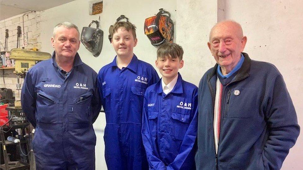 Harvey and Ollie with their grandfather and great-grandfather