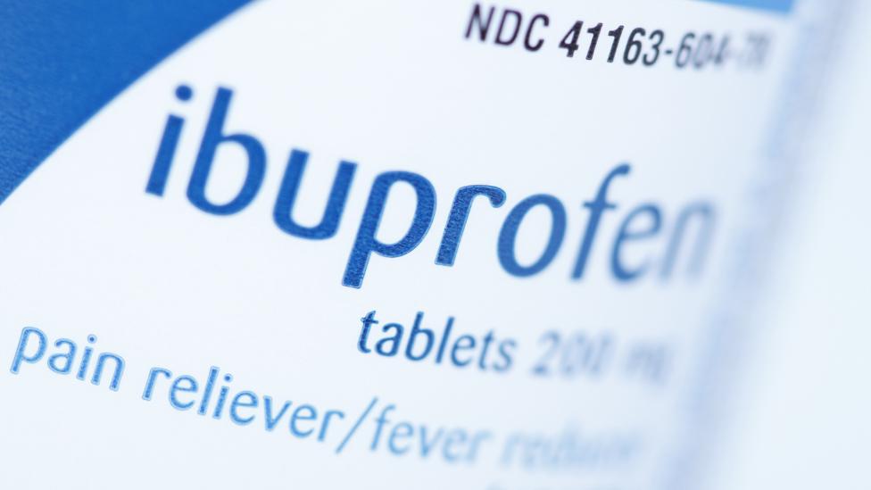 Ibuprofen tablets in a bottle